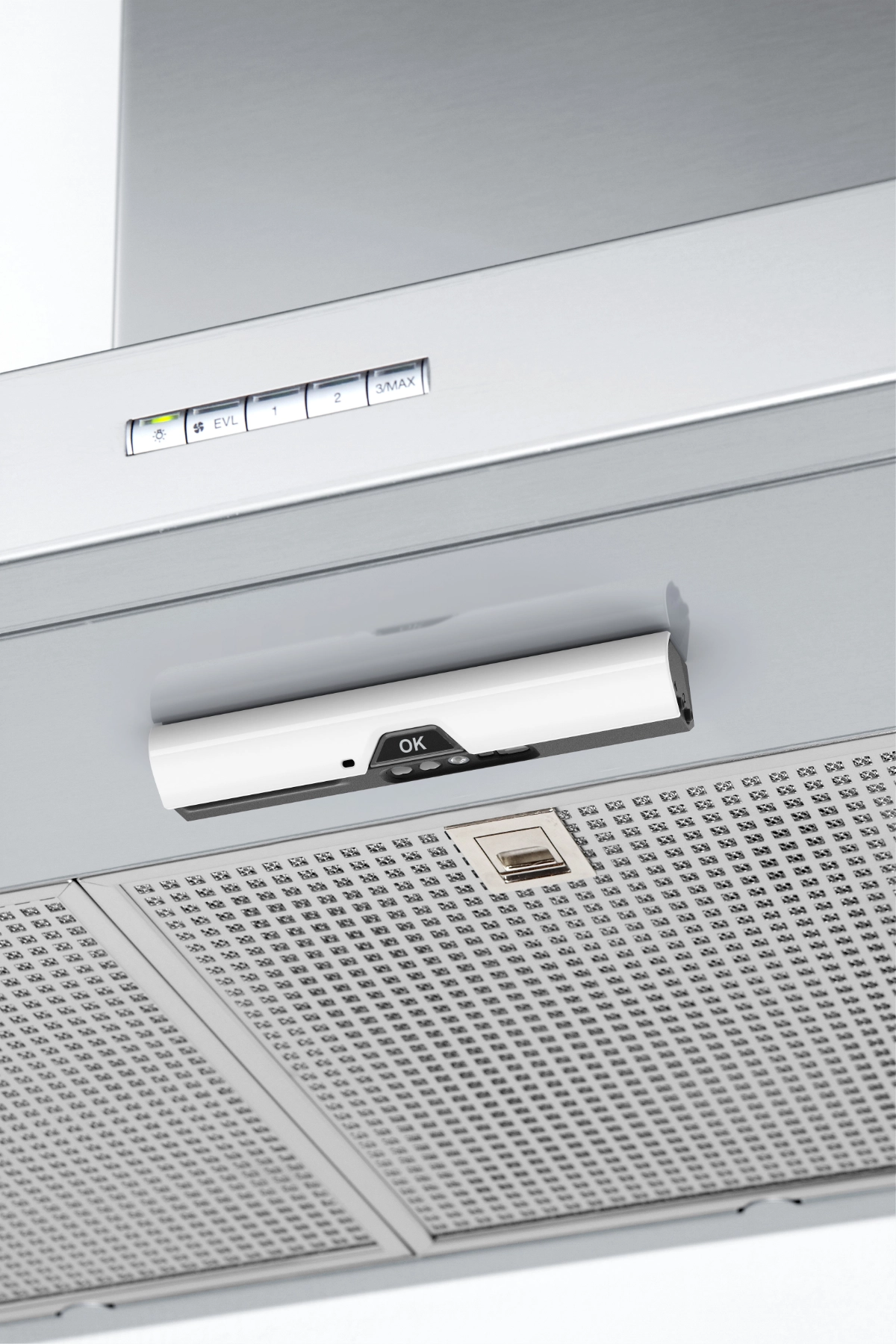 Airis stove guard mounted on a stainless steel cooker hood