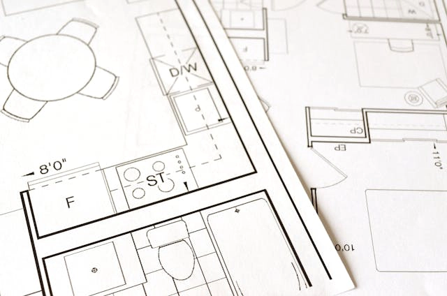Architect working on building design plans